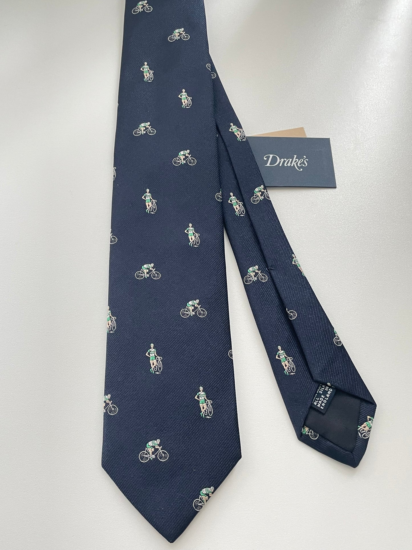 Limited Drakes Navy and Green Tipped Silk Tie with Bike Cycling Motif Sports Collection