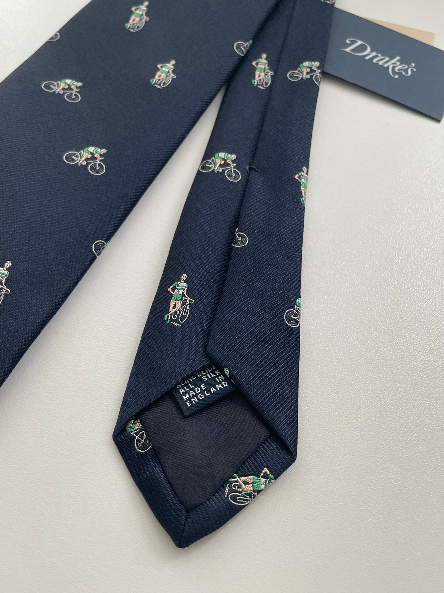 Limited Drakes Navy and Green Tipped Silk Tie with Bike Cycling Motif Sports Collection