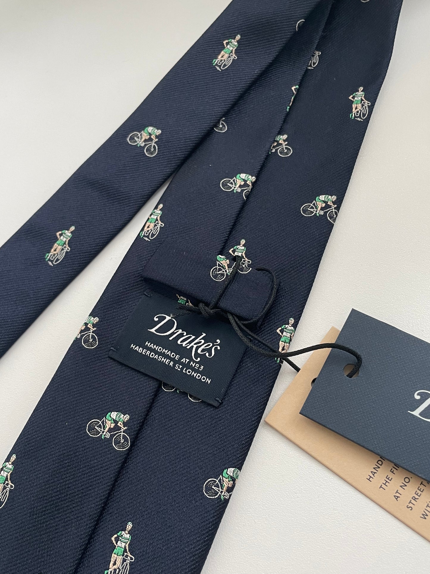 Limited Drakes Navy and Green Tipped Silk Tie with Bike Cycling Motif Sports Collection